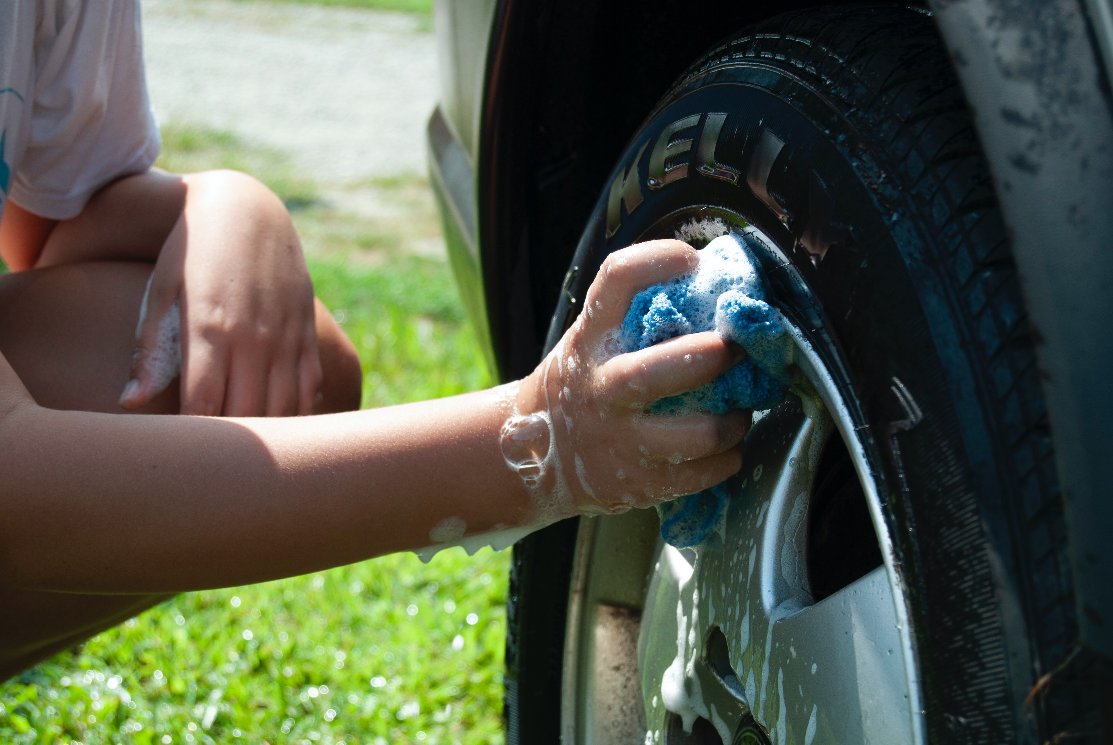 car wheel washed by hand